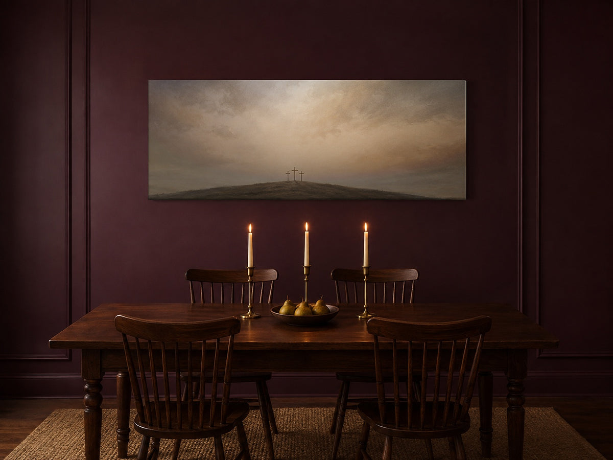Three Crosses at Calvary canvas in a plum dining room with lit taper candles