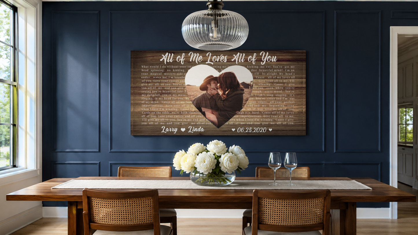 Custom lyric canvas on a navy panelled dining room wall above a walnut table with white peonies