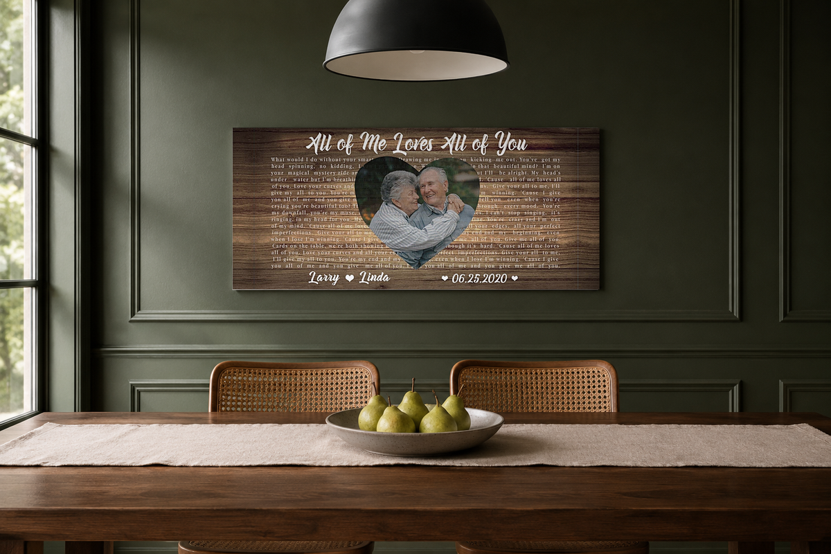 Personalized anniversary lyric canvas on a forest green dining room wall above a walnut table