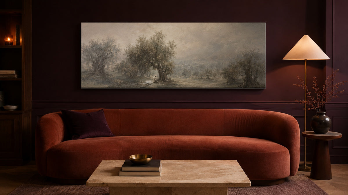 Gethsemane olive grove canvas above a rust velvet sofa in a burgundy living room