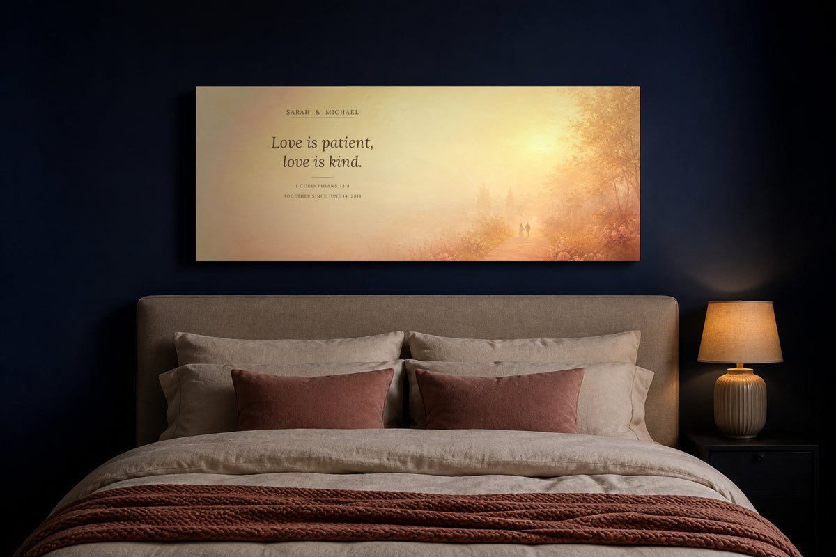 Personalized Love is Patient Scripture canvas above the bed in a deep navy bedroom with warm lamplight