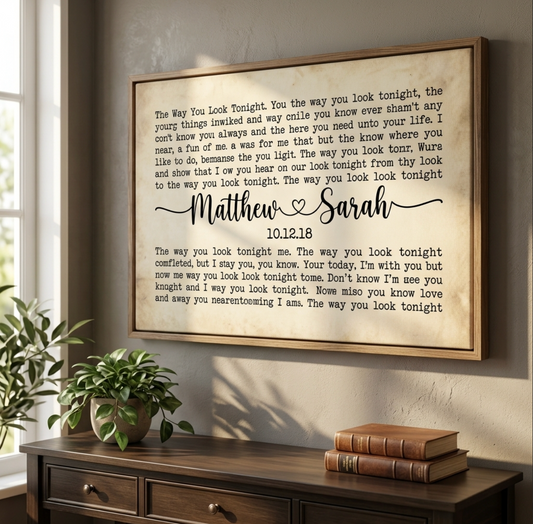 Couple sitting together by fireplace with You Had Me From Hello vintage song lyric canvas above mantel