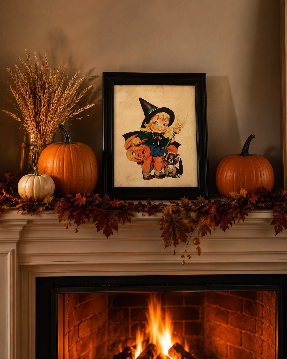 Vintage 1950s Halloween witch girl 8x10 print in black frame on autumn fireplace mantel with pumpkins, dried wheat and firelight