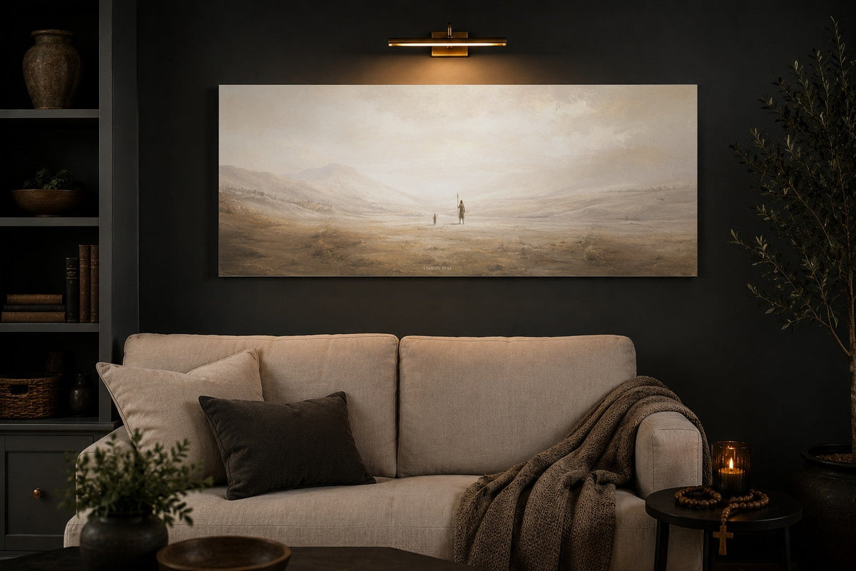 David and Goliath Christian canvas above a cream linen sofa in a charcoal living room with brass picture light