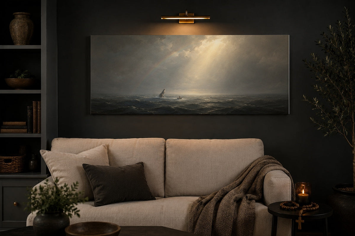 Jonah and the Whale canvas above a cream linen sofa in a charcoal living room with brass picture light