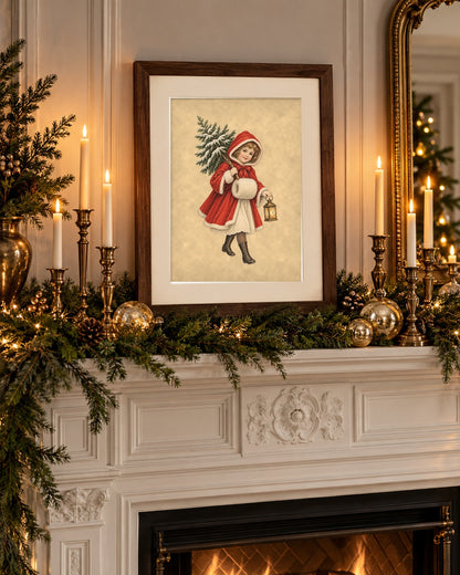 Framed vintage Christmas girl print on a white mantel with pine garland and candles