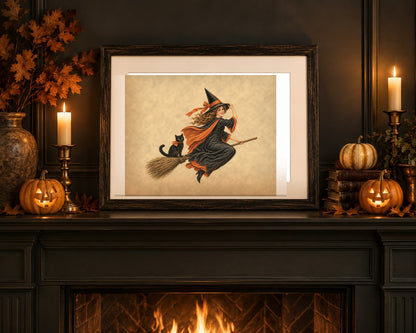 Vintage Halloween witch print framed on a mantel with carved pumpkins and candlelight