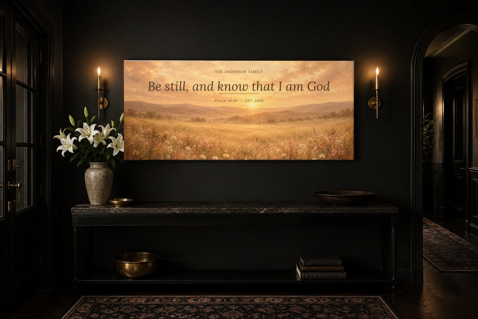Custom scripture canvas in a black entryway with brass sconces