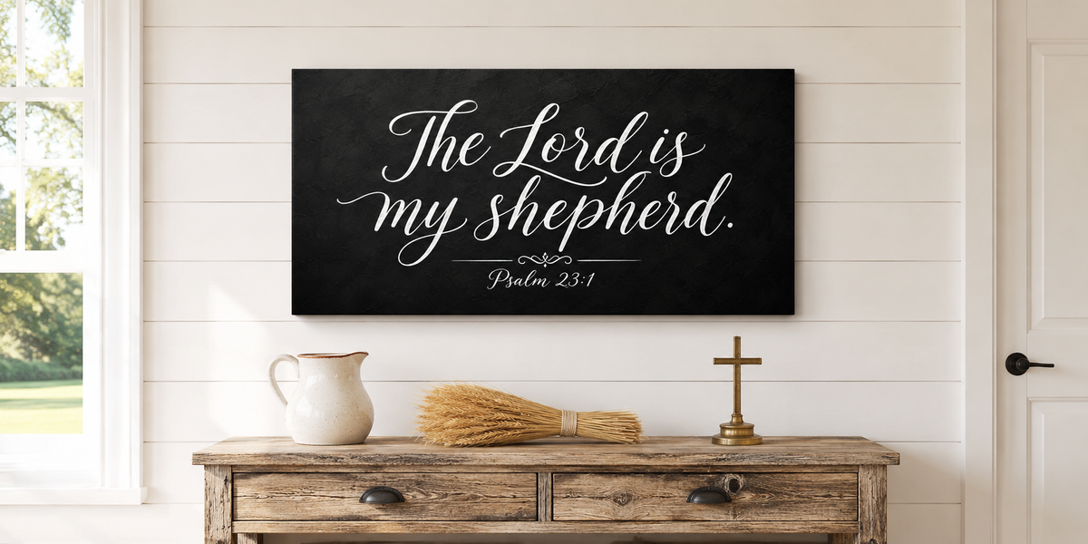 The Lord Is My Shepherd Psalm 23 canvas on whitewashed farmhouse shiplap wall above rustic console with dried wheat and brass cross