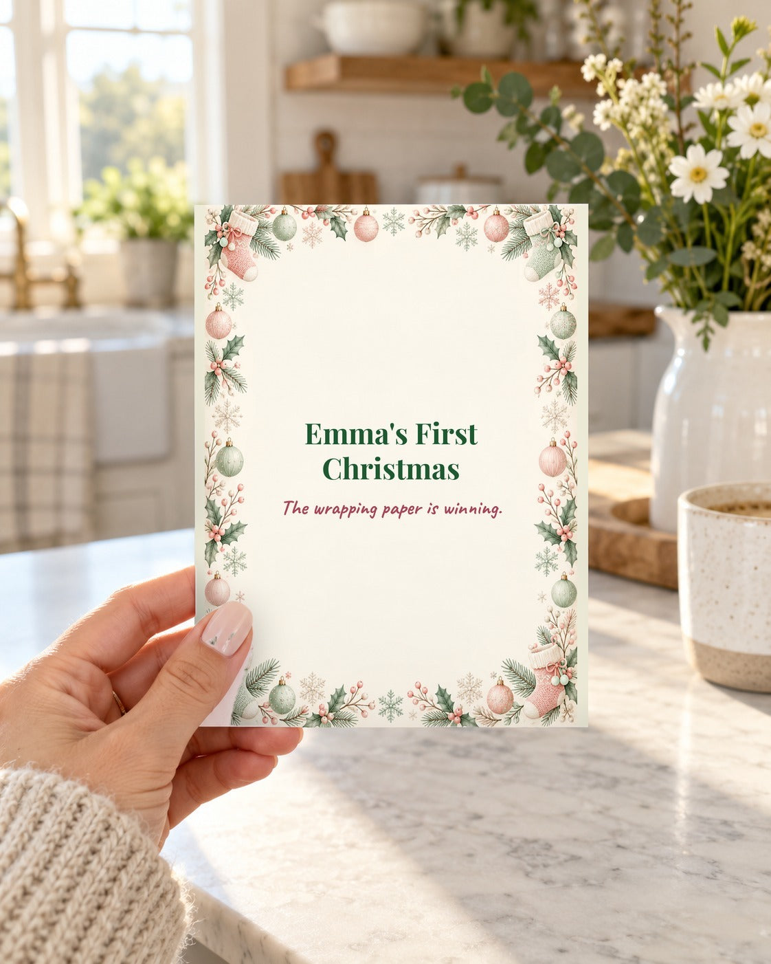 Funny Baby's First Christmas card held in a kitchen: Emma's First Christmas