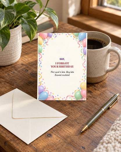 Funny belated birthday card styled on a desk