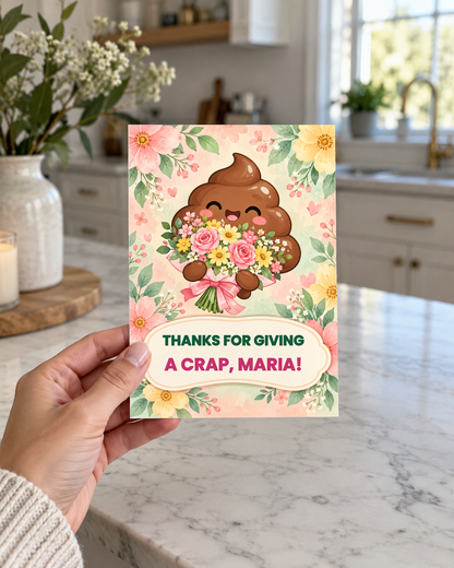 Hand holding the floral thank you card in a kitchen