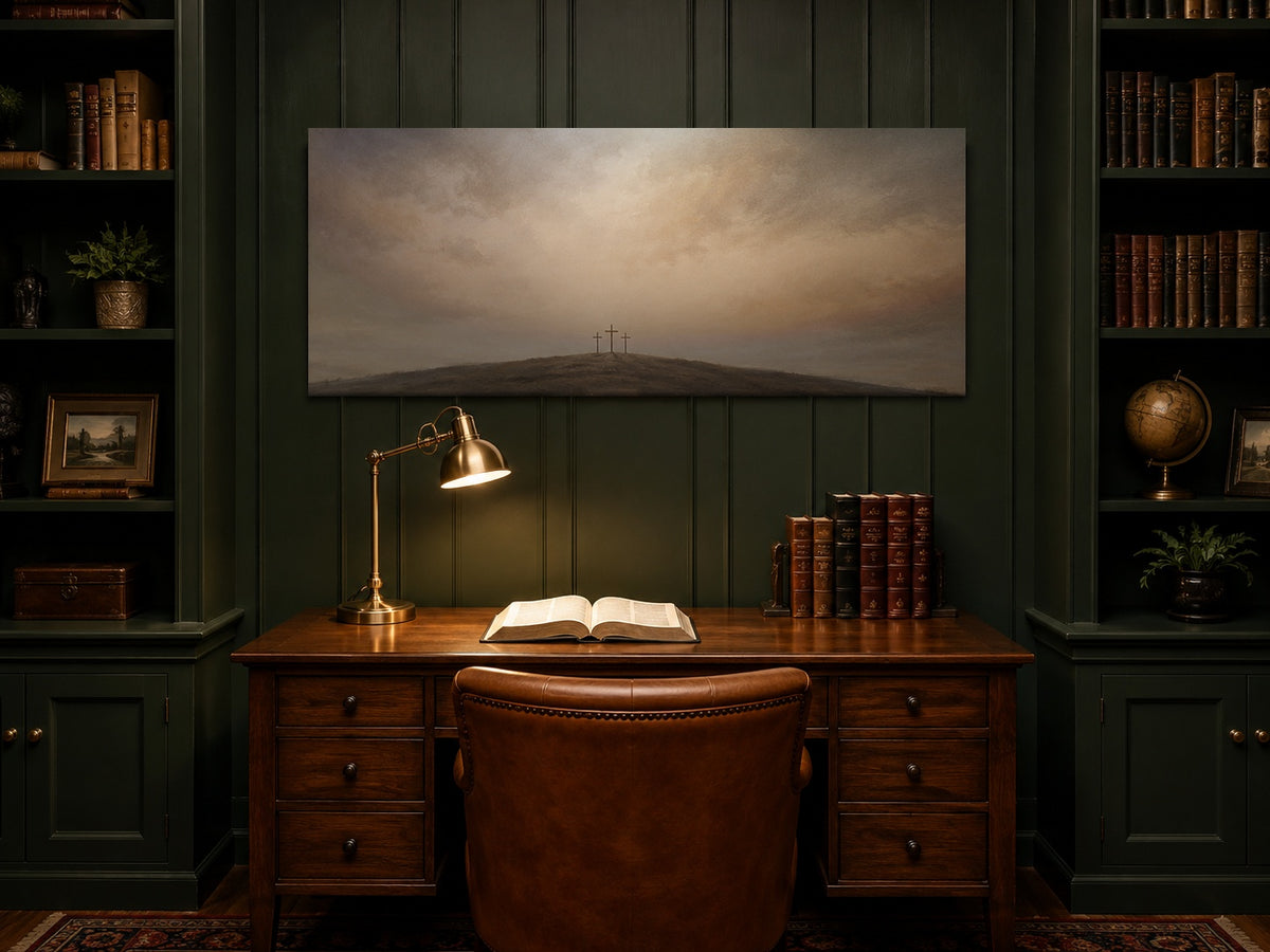 Three Crosses at Calvary canvas above a walnut desk in a deep green study with open Bible