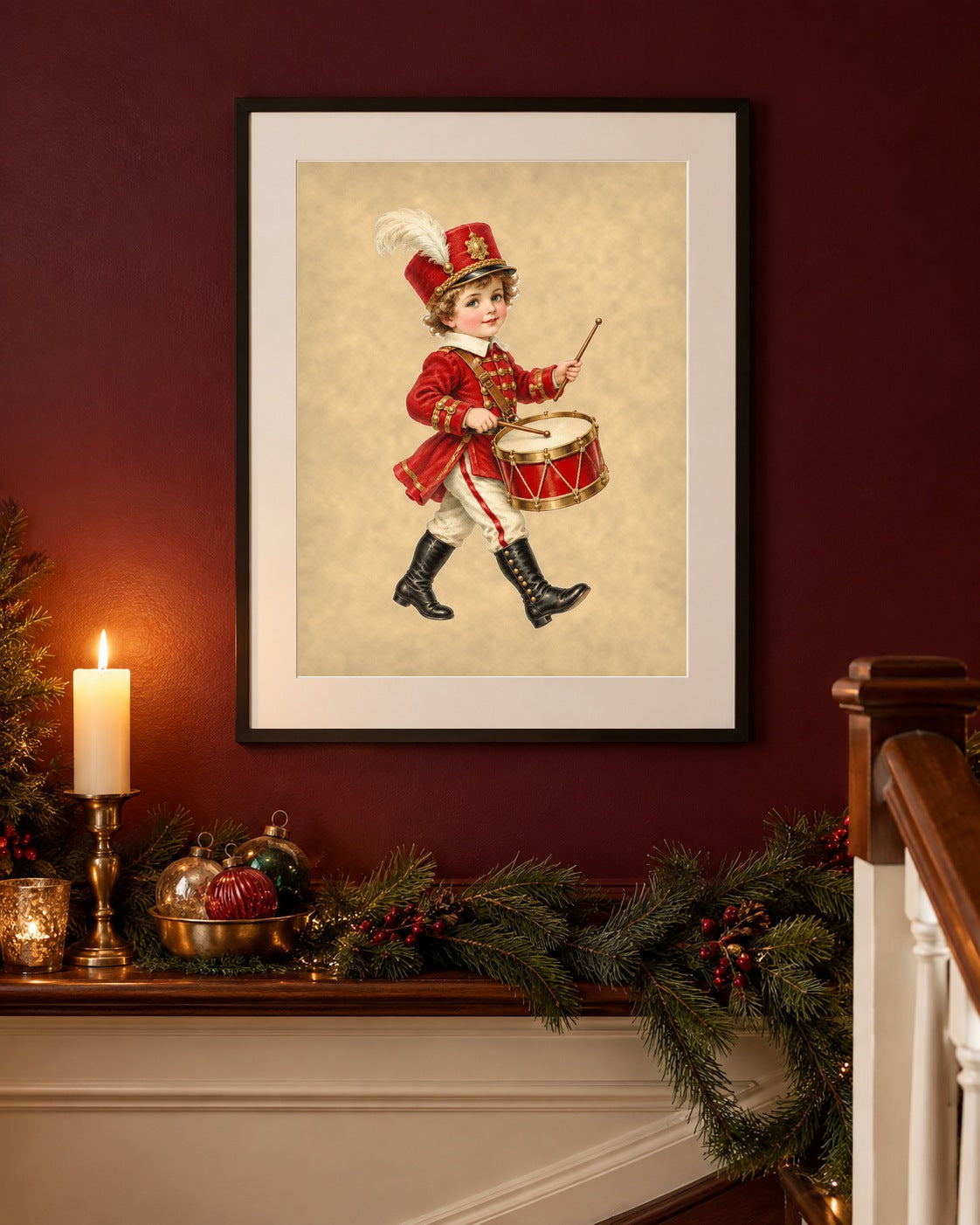 Little Drummer Boy Christmas print framed above a pine-garland staircase ledge on a burgundy wall