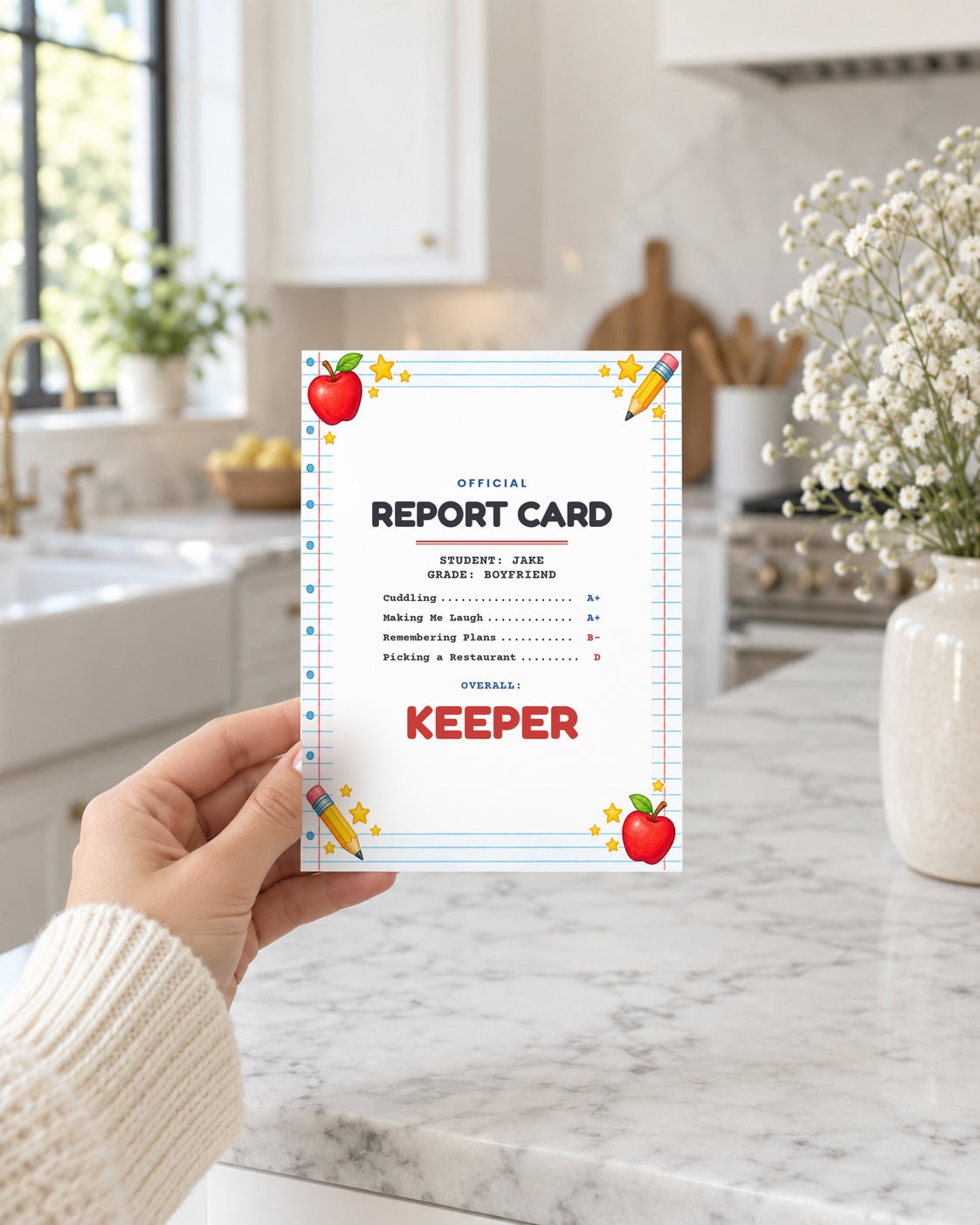 Hand holding the boyfriend report card in a bright kitchen