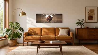 Custom first dance song lyrics panoramic canvas hanging above a walnut mid-century sofa in a sunlit living room