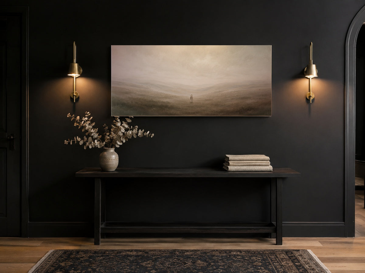 Good Shepherd canvas in a black entry hall with brass sconces