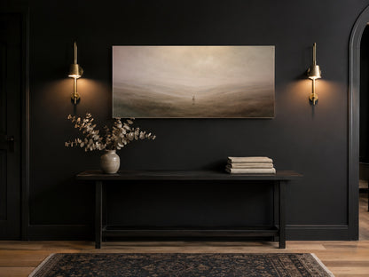 Good Shepherd canvas in a black entry hall with brass sconces