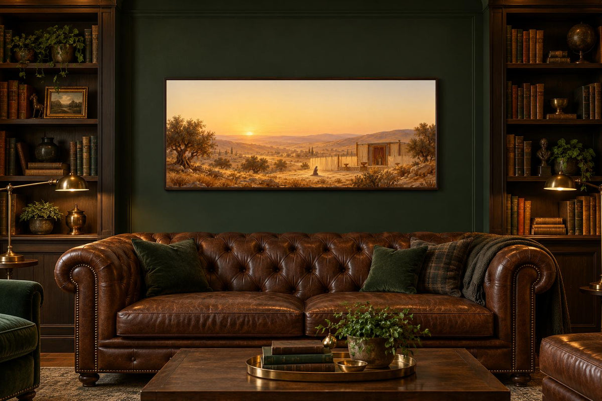 Hannah's Prayer canvas staged above a leather chesterfield in a dark green library
