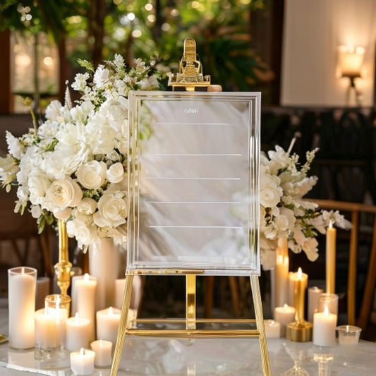 Clear acrylic wedding seating chart on gold easel