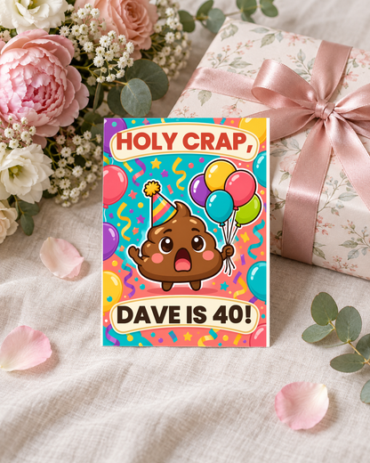 Birthday card leaning on a wrapped gift with flowers