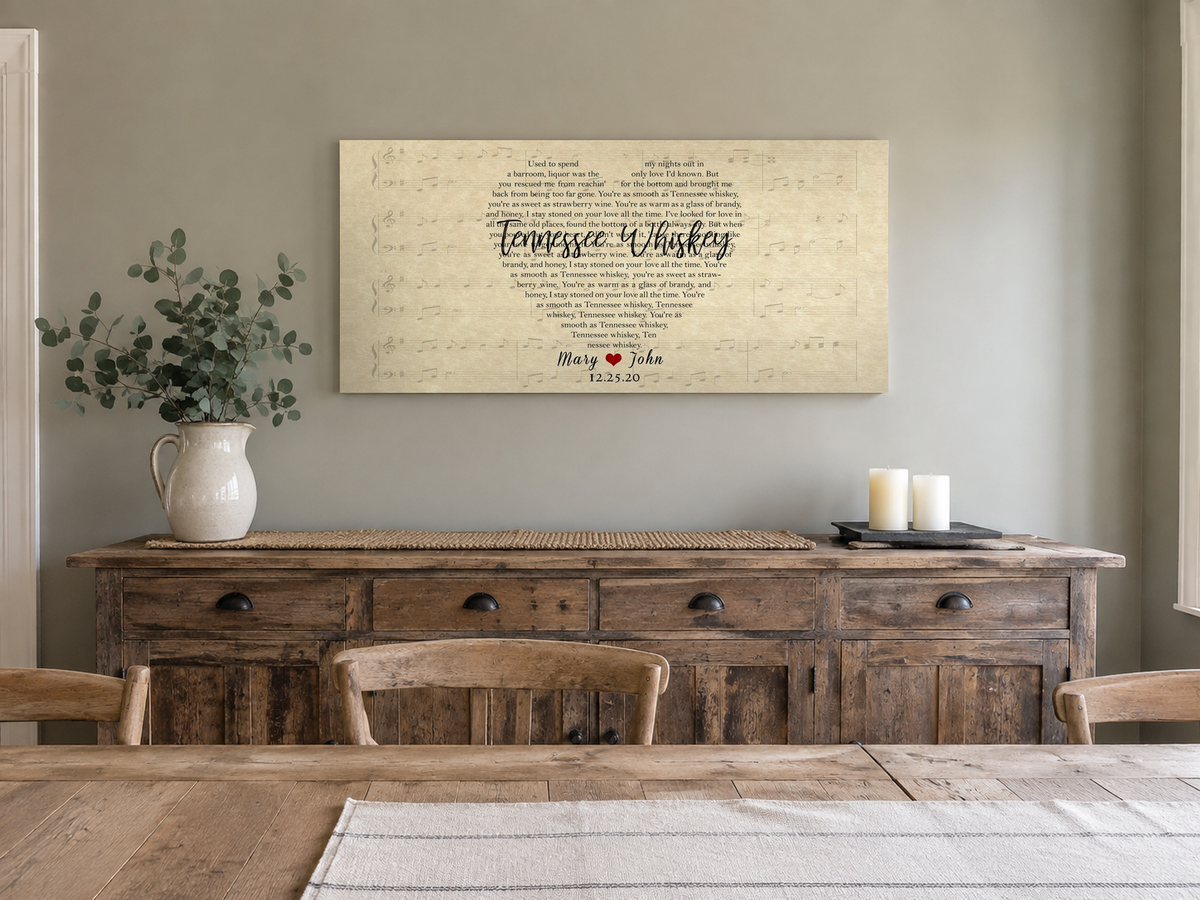 Personalized panoramic song lyrics canvas above a reclaimed wood sideboard in a rustic farmhouse dining room
