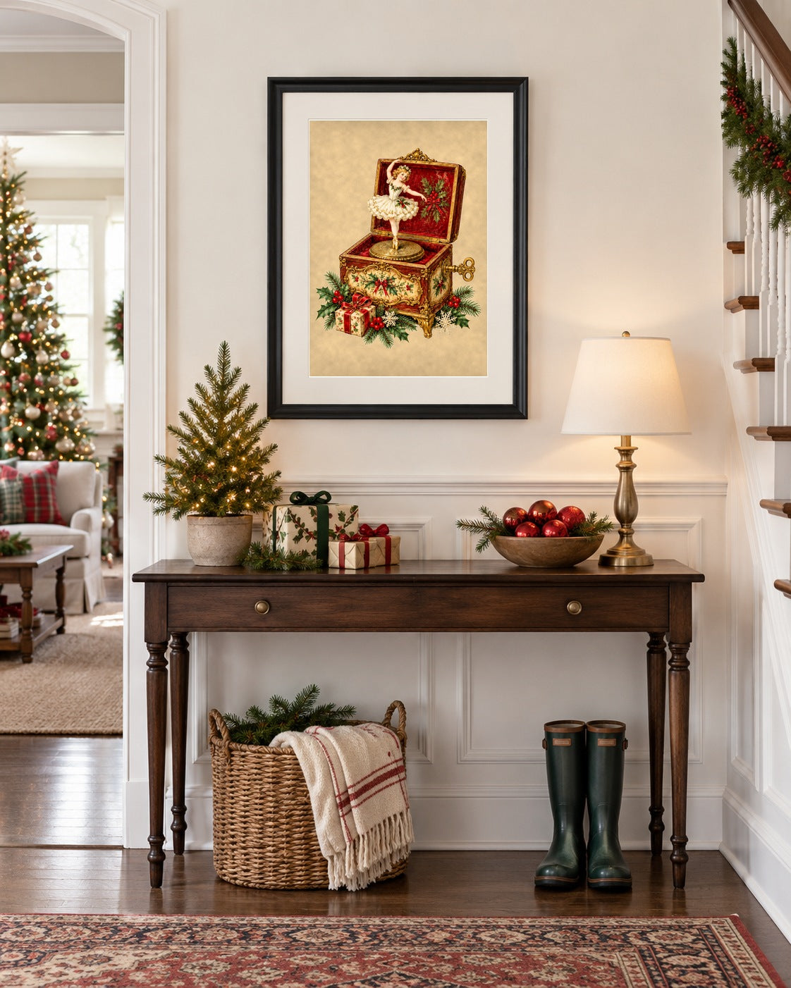 Framed vintage Christmas music box print above an entryway console with mini tree