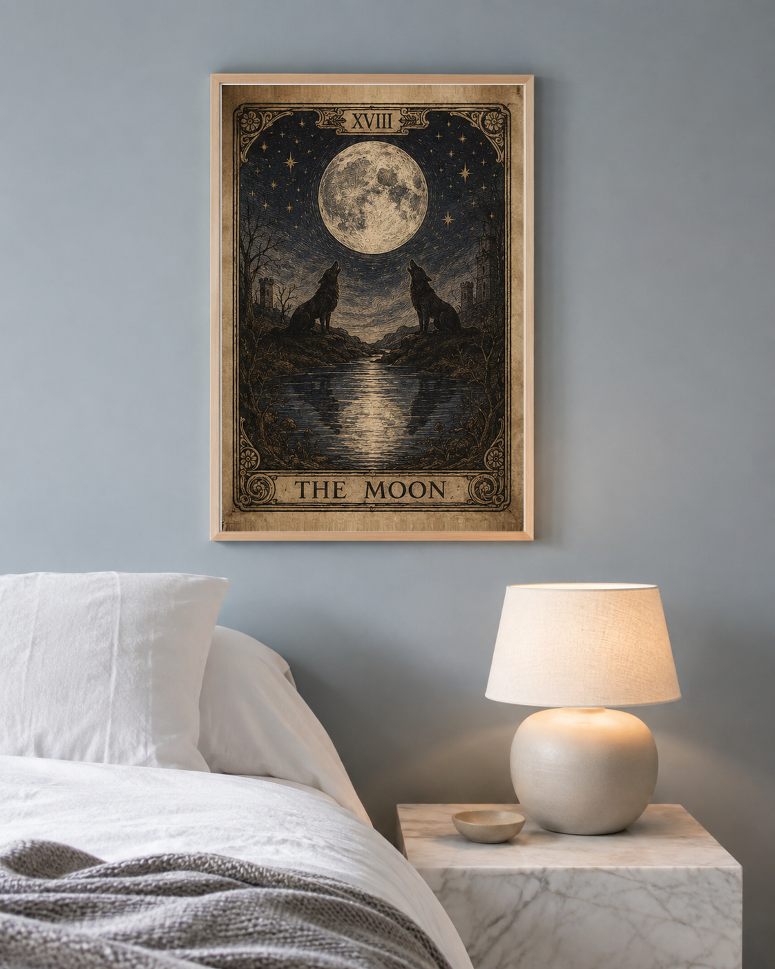 Vintage Tarot The Moon 8x10 print above a marble nightstand in a dusty blue grey bedroom with white linen bedding