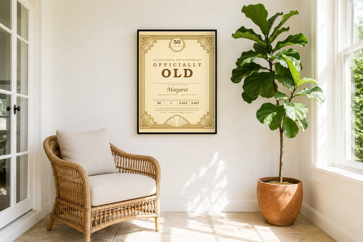 Officially Old birthday award print framed in a bright sunroom