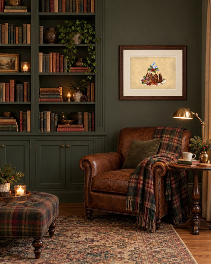 Victorian Christmas pudding print framed in a home library with leather armchair and plaid throw