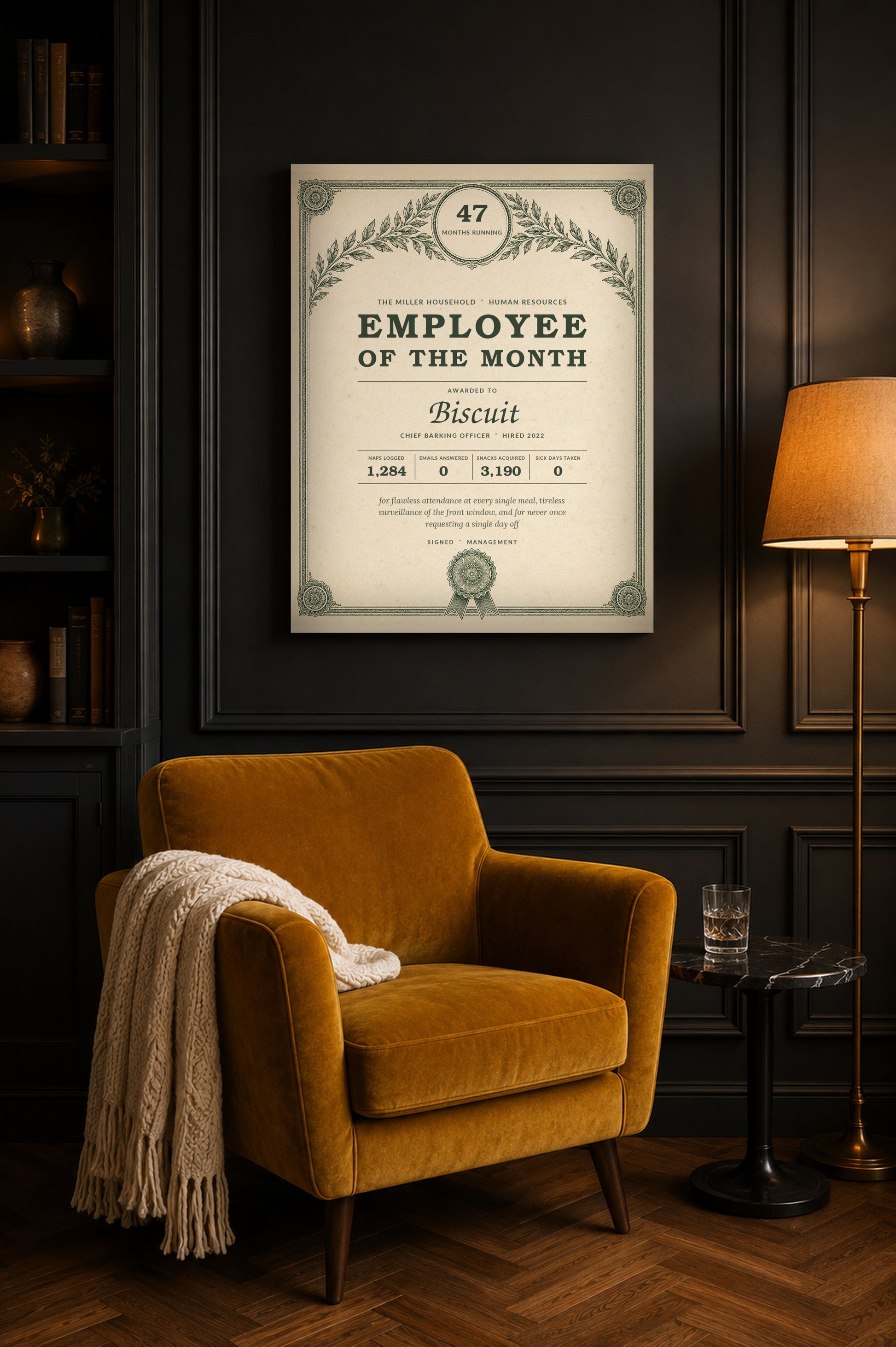 Pet award print on a charcoal panelled living room wall above a mustard velvet armchair