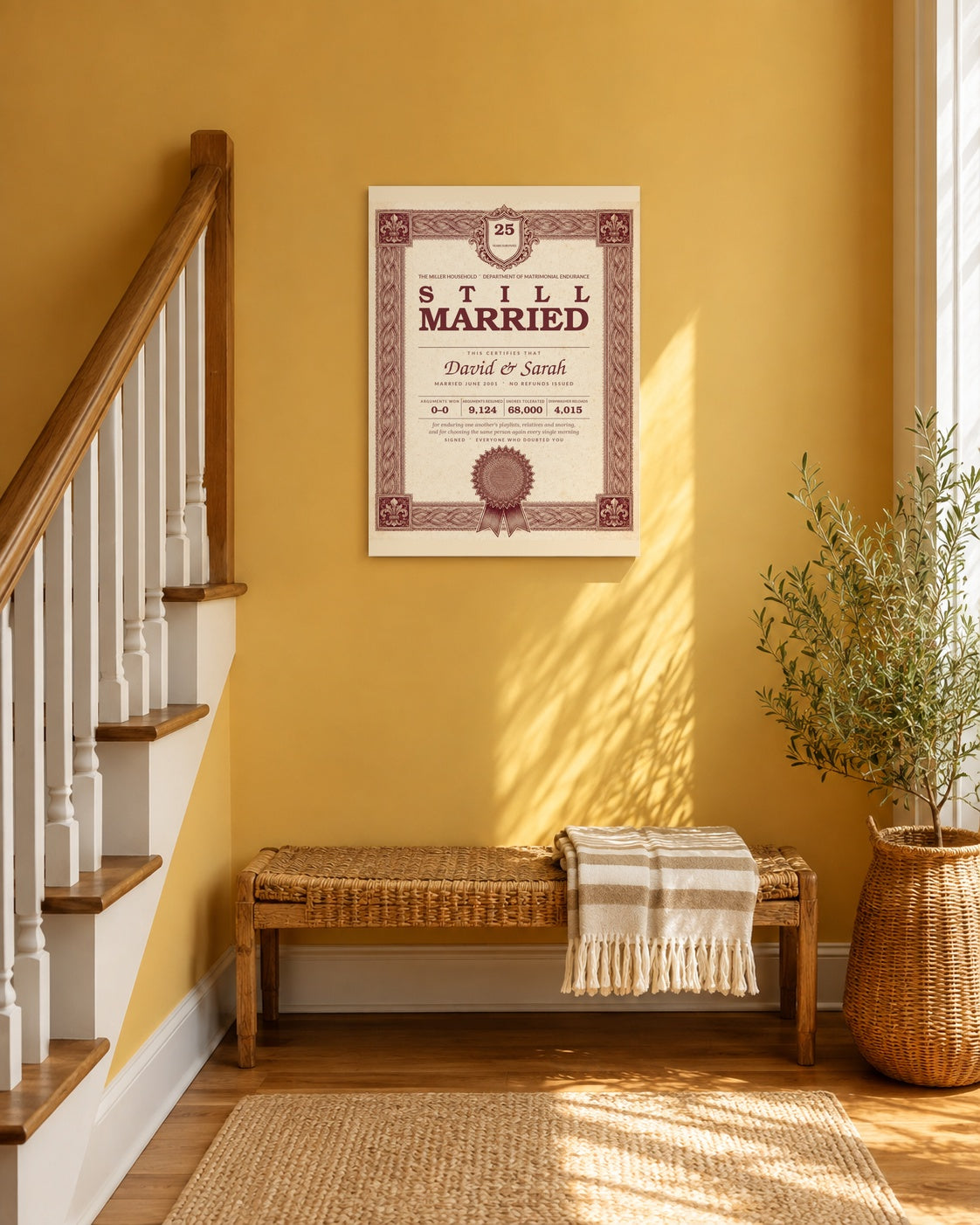 Personalized Still Married anniversary roast certificate print hanging on an ochre stair landing wall