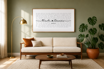 Custom song lyrics canvas hanging above a mid-century sofa in a sage green living room