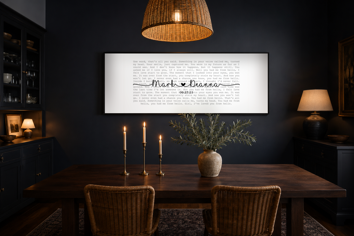 First dance lyric canvas on a charcoal navy dining room wall with brass taper candles