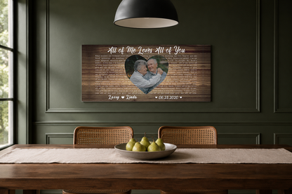 Personalized anniversary lyric canvas on a forest green dining room wall above a walnut table