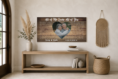 Custom wedding song lyric heart photo canvas above an oak console with pampas grass in a boho entryway