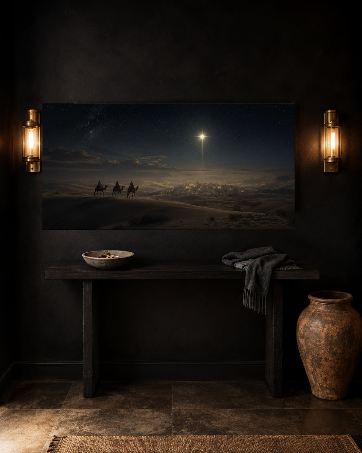 Star of Bethlehem canvas in a black entryway with brass sconces and console table
