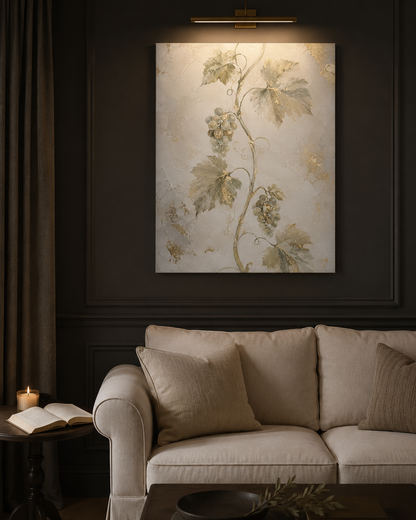 Vine and Branches canvas above a cream linen sofa in a charcoal living room with brass picture light