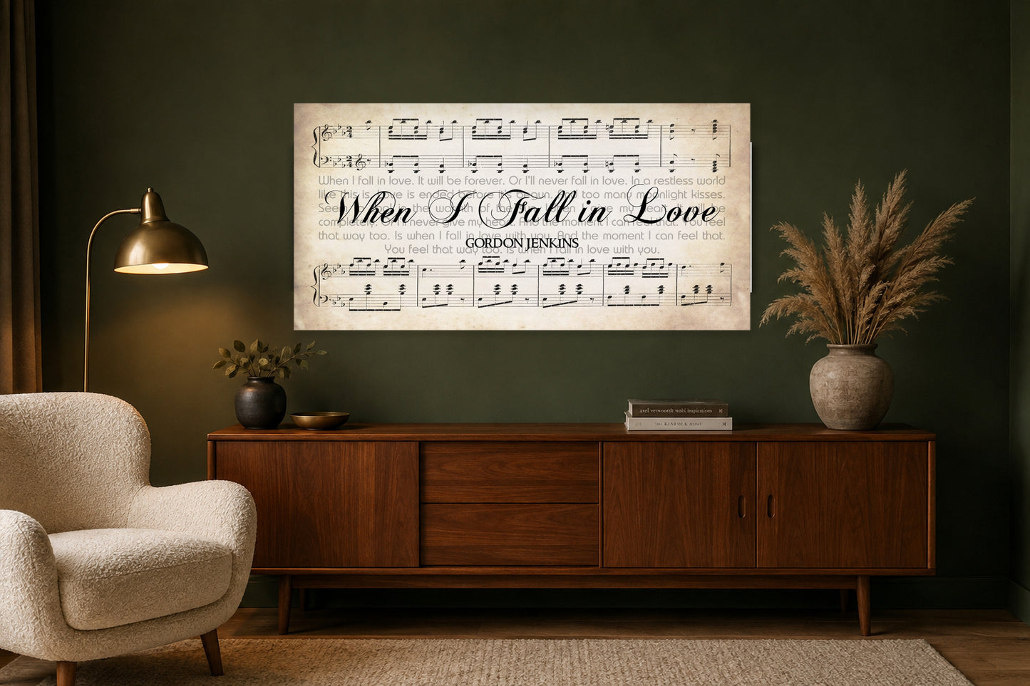 When I Fall in Love song lyrics canvas hung above a walnut credenza in a forest green mid-century living room