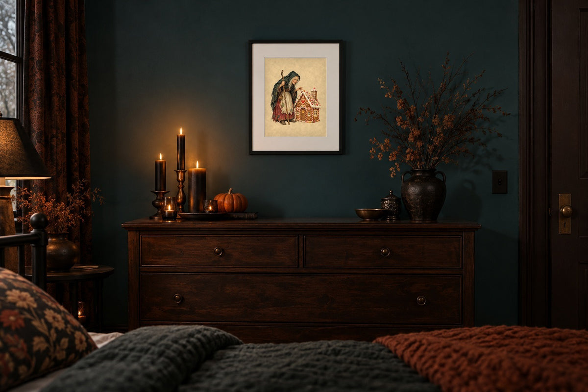 Vintage gingerbread witch print framed above a moody Halloween bedroom dresser